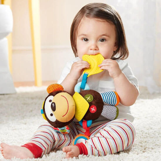 doudou bébé partout singe mordu