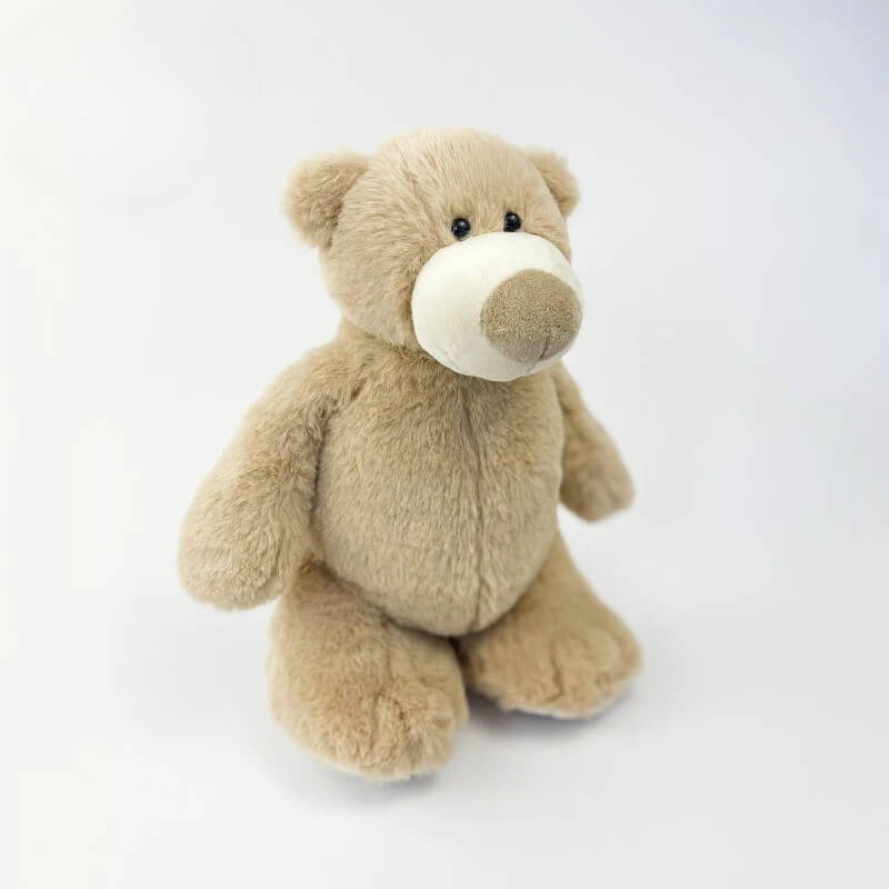ours en peluche léo profile