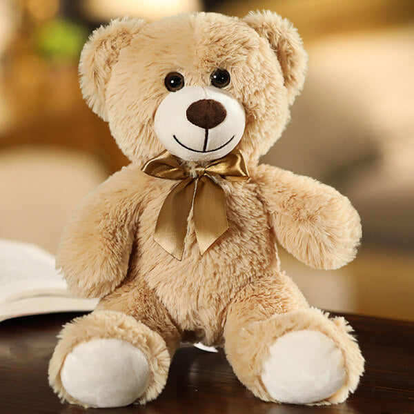 ours en peluche avec nœud brun claire