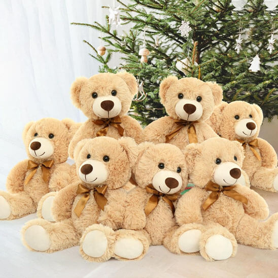 ours en peluche avec nœud cadeau noel
