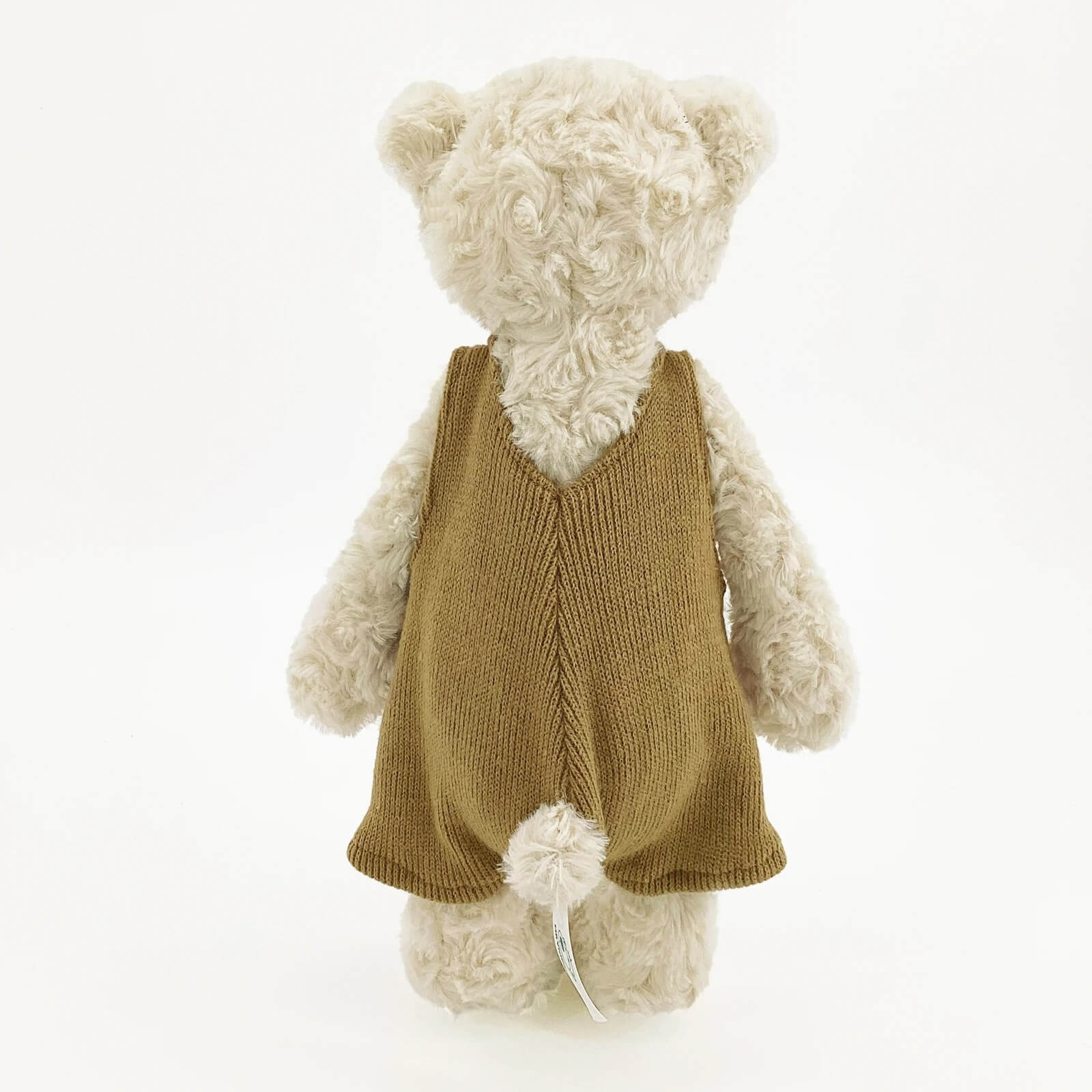 ours en peluche teddy calme dos